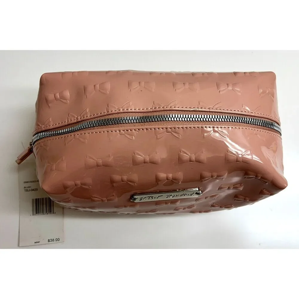 Betsey Johnson embossed patent travel/cosmetic bag in blush pink. NWT.